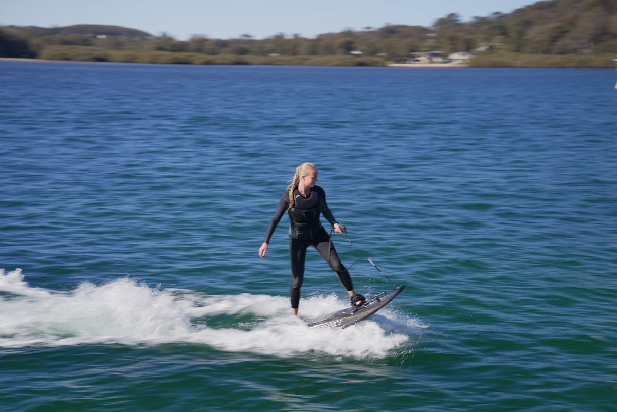 Rider on a Torque electric surfboard