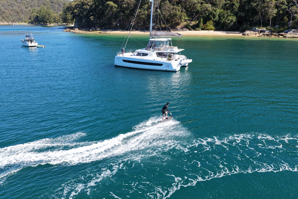 Rider on a Torque electric surfboard